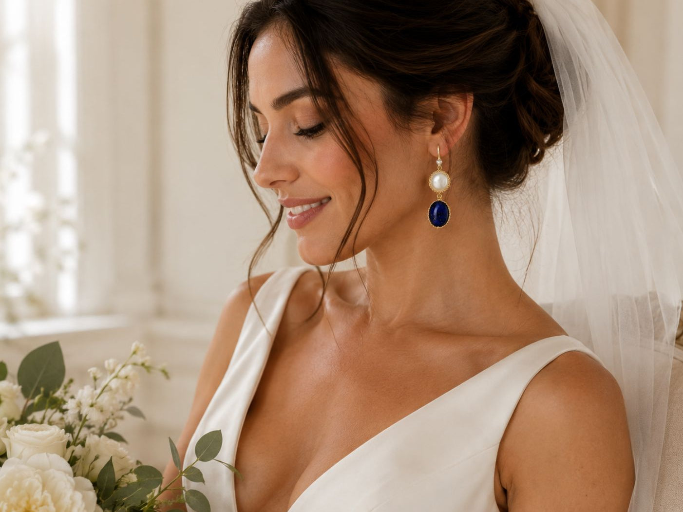 Pearl earring on bride - wedding edit