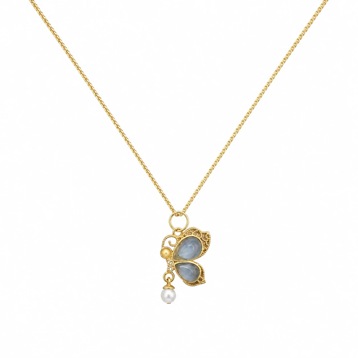 Gold-tone butterfly pendant necklace with blue stones and pearl-style drop