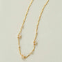 Gold necklace with small pearls 