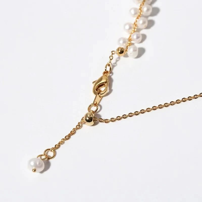 Gold chain necklace with pearl beads 