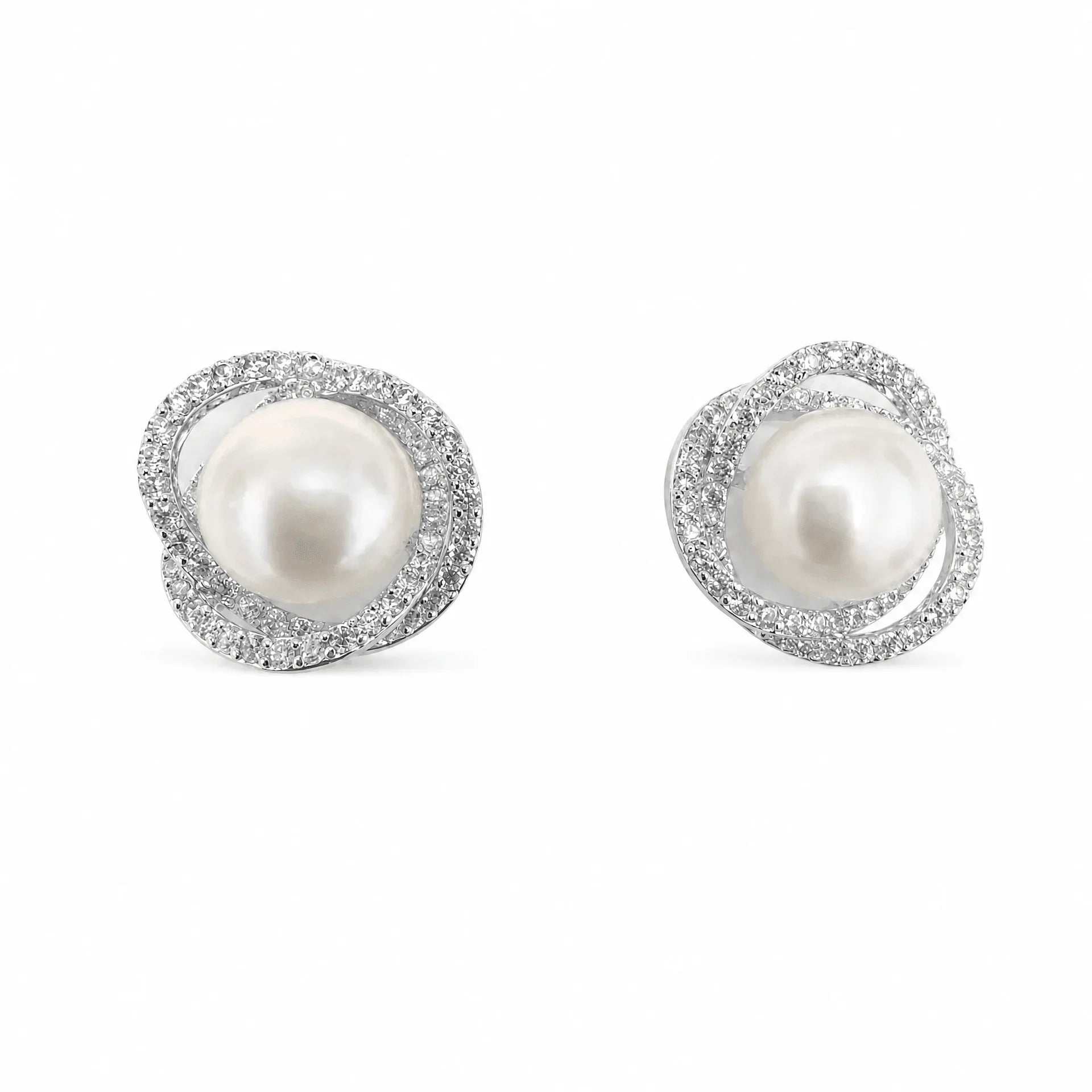 Silver-tone freshwater pearl stud earrings with a double halo of clear crystals