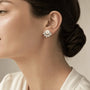 Close-up of natural freshwater pearls and clear crystal leaf details