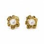 Gold-tone sculpted flower stud earrings with natural freshwater pearl centres
