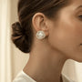 Model wearing silver-tone freshwater pearl crystal rose stud earrings