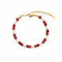 Rhodonite and mother-of-pearl beaded bracelet with gold-tone spacers and adjustable chain on a white background