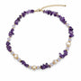 Amethyst chip lavender bead and baroque pearl necklace on a white background