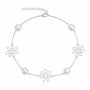 Silver-tone daisy necklace with openwork flowers and luminous white pearls
