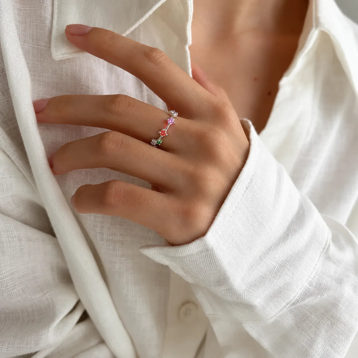 Woman wearing a multicolour zircon vine open ring in polished S925 sterling silver