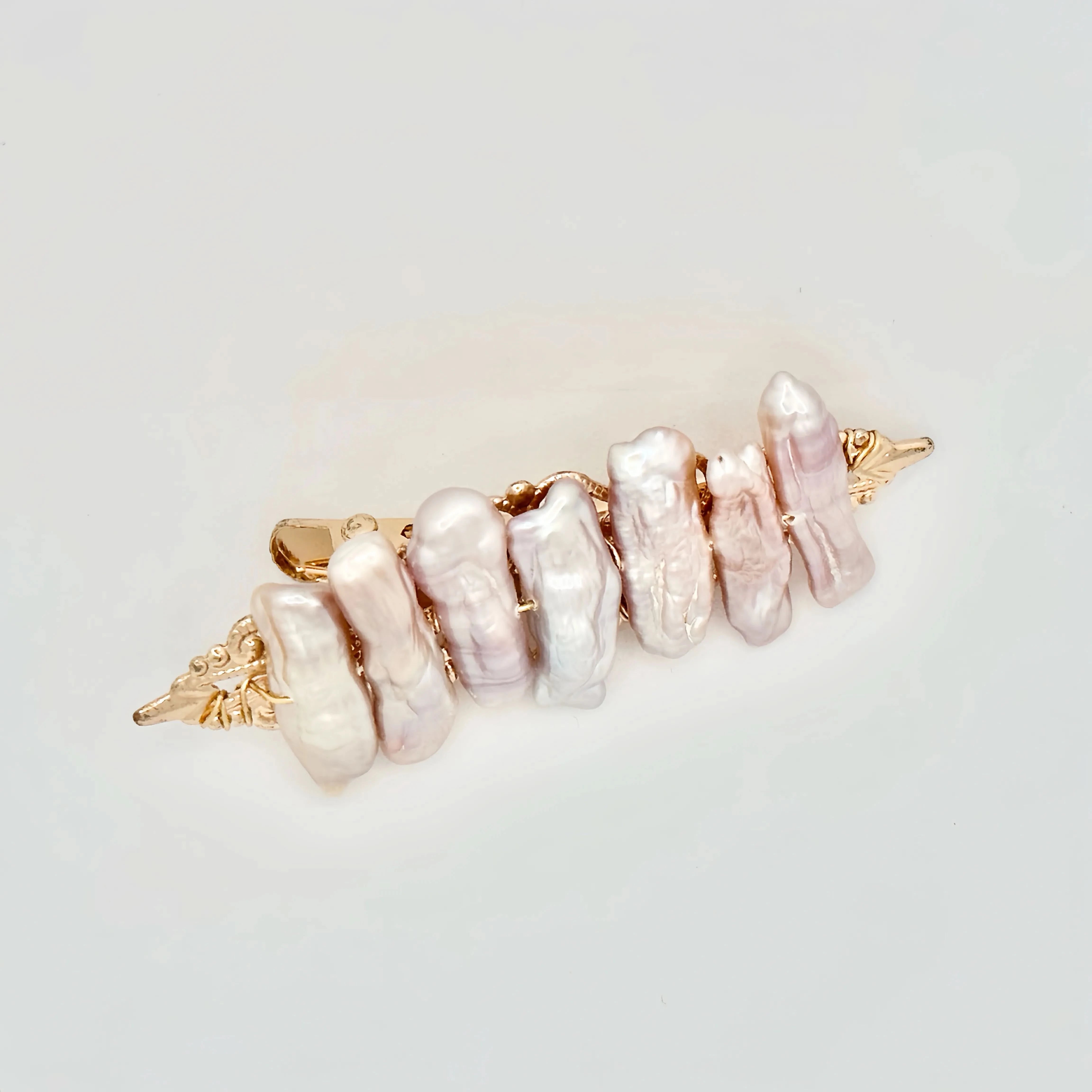 Discover the elegance and charm of our Pearl Hair Accessories – Angel  Barocco