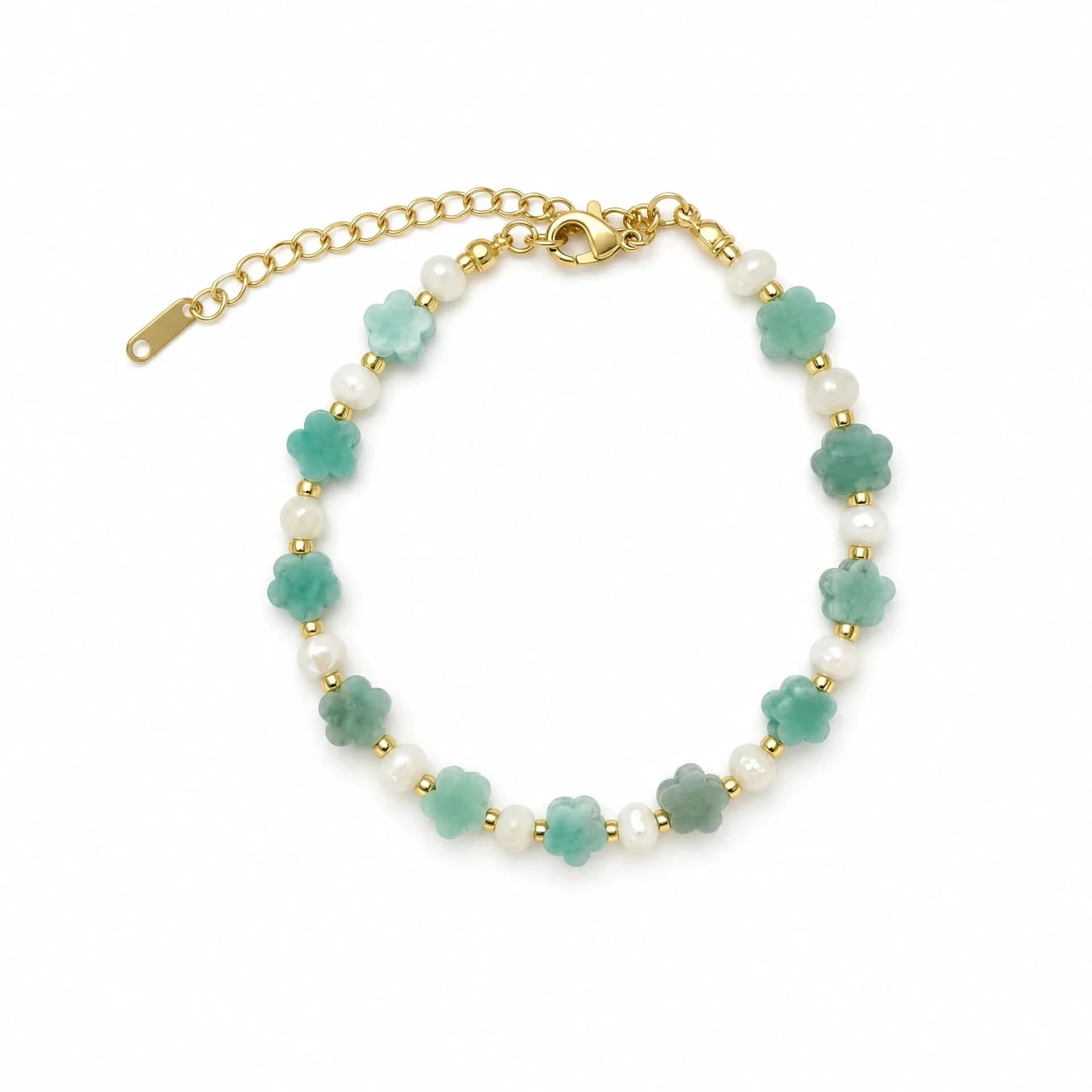 Amazonite flower and freshwater pearl bracelet with gold-tone spacers on a white background