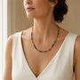 Mixed natural gemstone necklace with aventurine worn at a three quarter angle