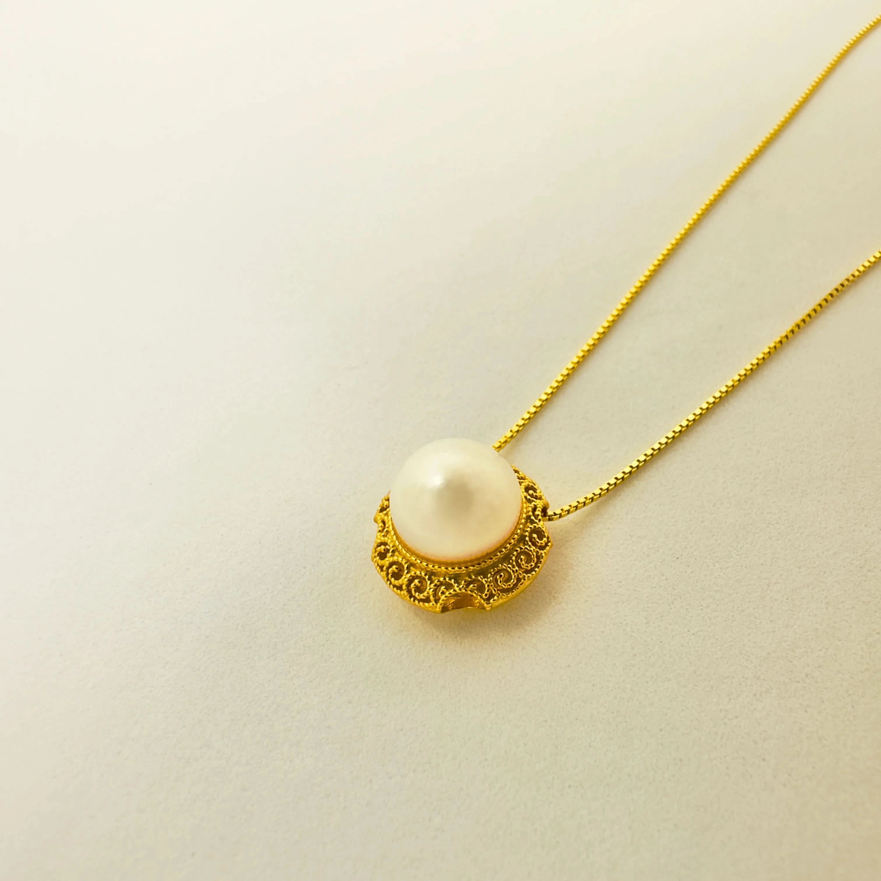 necklace with pearl pendant