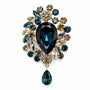 Deep Ocean Blue crystal cluster drop brooch on a white background