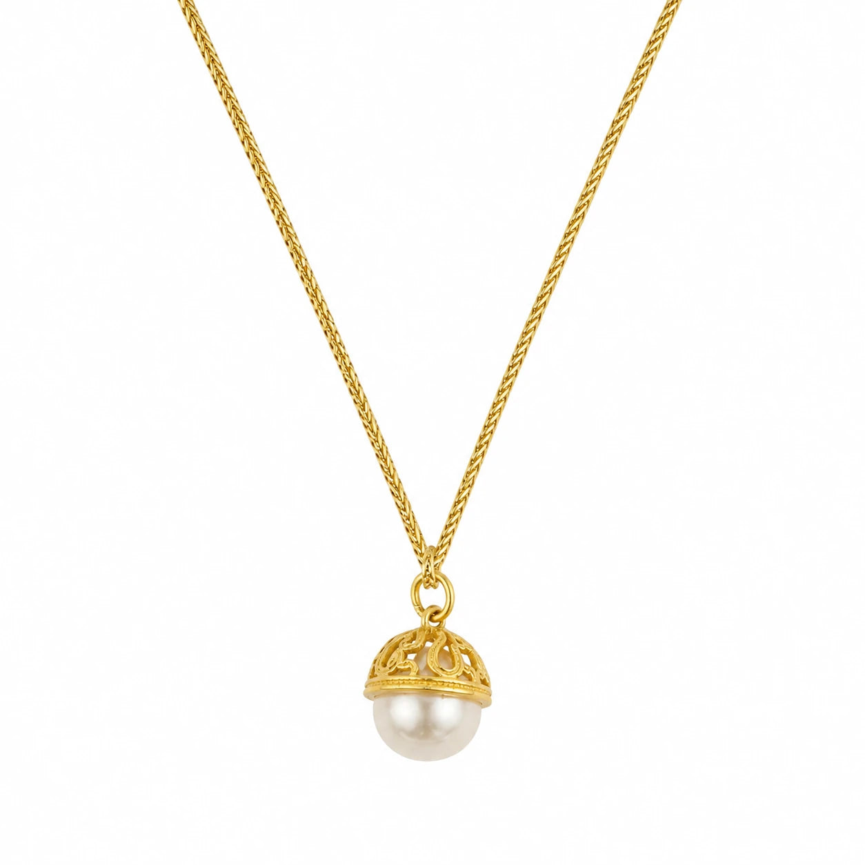 Gold-tone filigree pearl drop pendant necklace on a fine textured chain