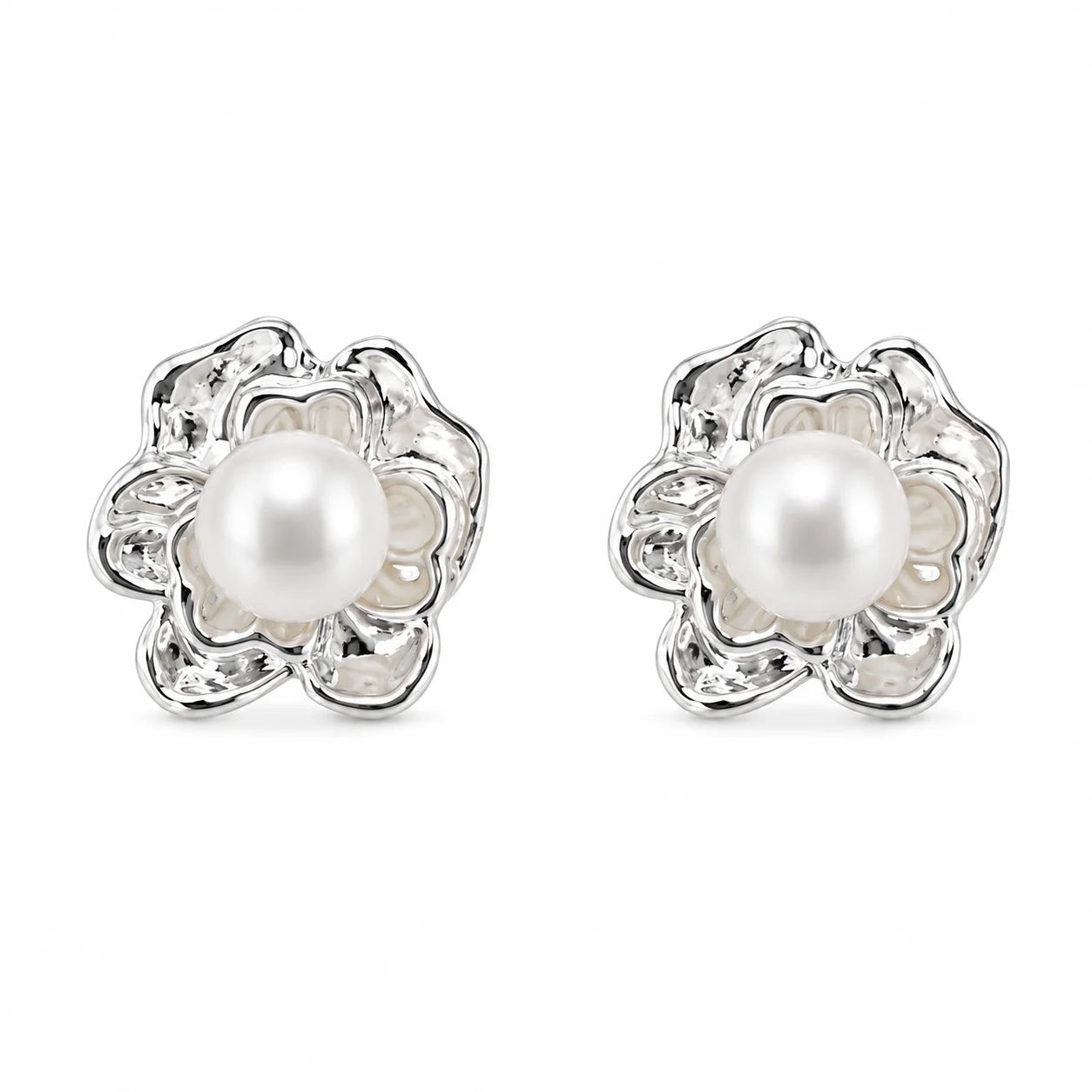 Silver-tone sculpted flower stud earrings with natural freshwater pearl centres