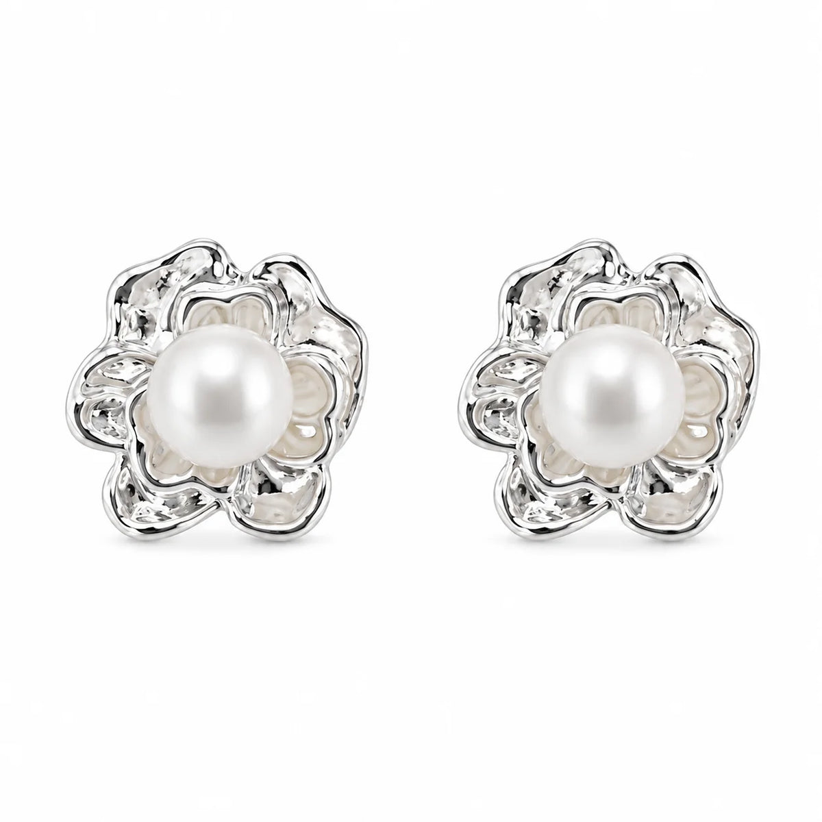 Silver-tone sculpted flower stud earrings with natural freshwater pearl centres