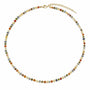 Pastel mixed natural gemstone beaded necklace with gold-tone spacers on a white background
