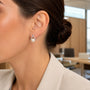 Model wearing silver-tone freshwater pearl crystal teardrop stud earrings