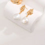 Fluid stud Baroque pearl earrings - Angel Barocco