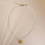 choker with pearl necklace