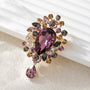 Vintage Amethyst crystal cluster drop brooch detail with faceted purple teardrop pendant