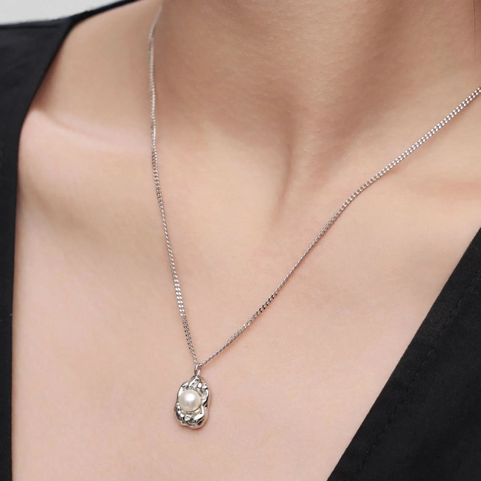 Pearl Pendant Necklace Features Lava Design