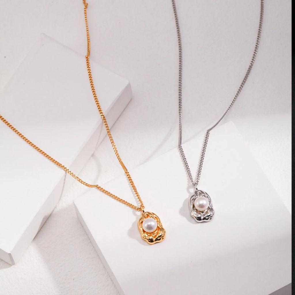 Pearl Pendant necklace features a lava design - Angel Barocco