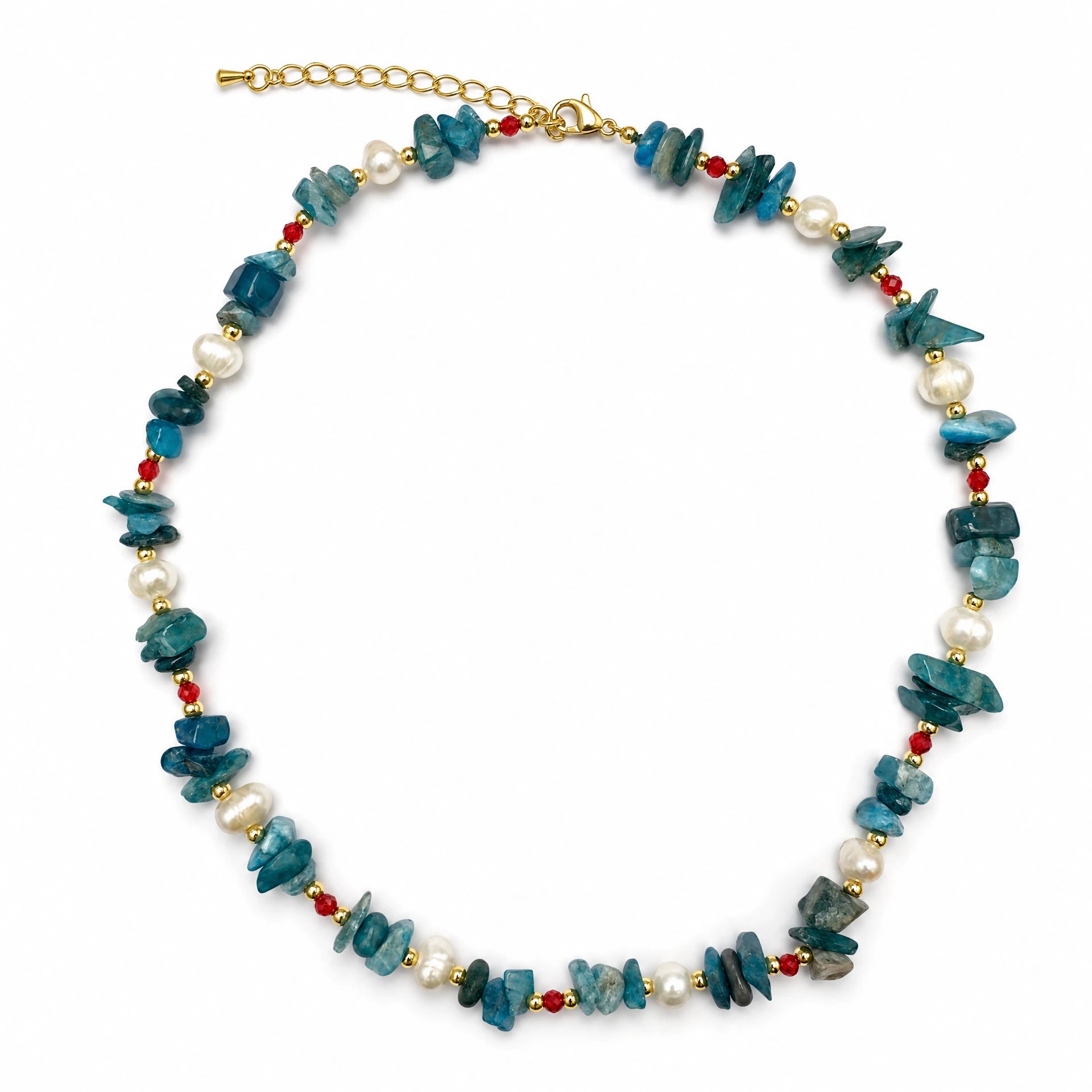 Blue apatite and freshwater pearl gemstone necklace on a white background