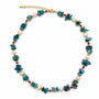 Blue apatite and freshwater pearl gemstone necklace on a white background