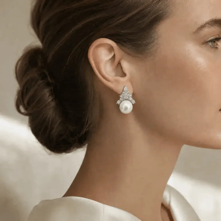 Close-up of marquise and pavé crystals above a white freshwater pearl