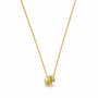 Gold-tone coiled snake pendant necklace with textured scales and clear crystal accents