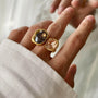 Woman wearing a gold-plated two-stone zirconia statement ring