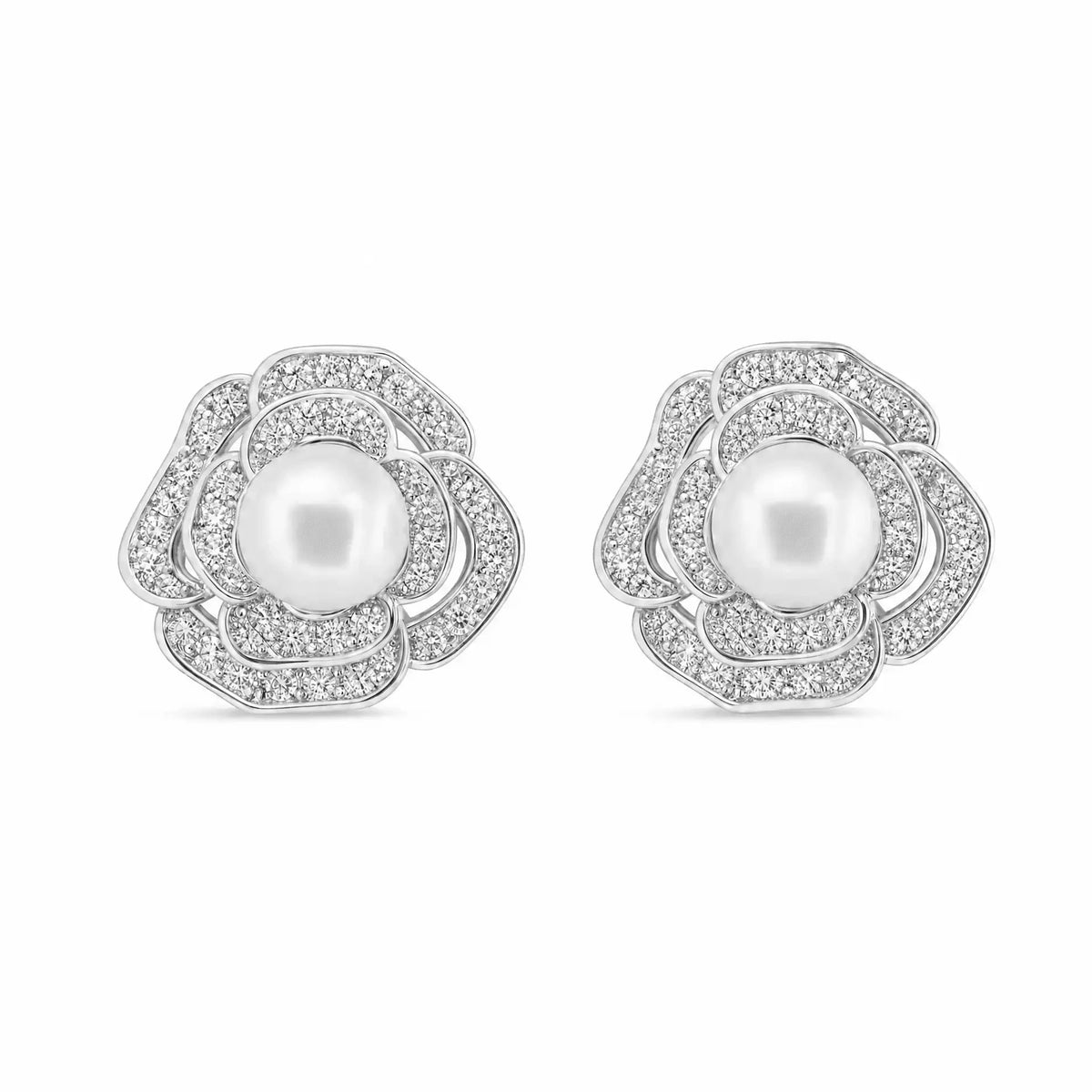 Silver-tone crystal rose stud earrings with white freshwater pearl centres