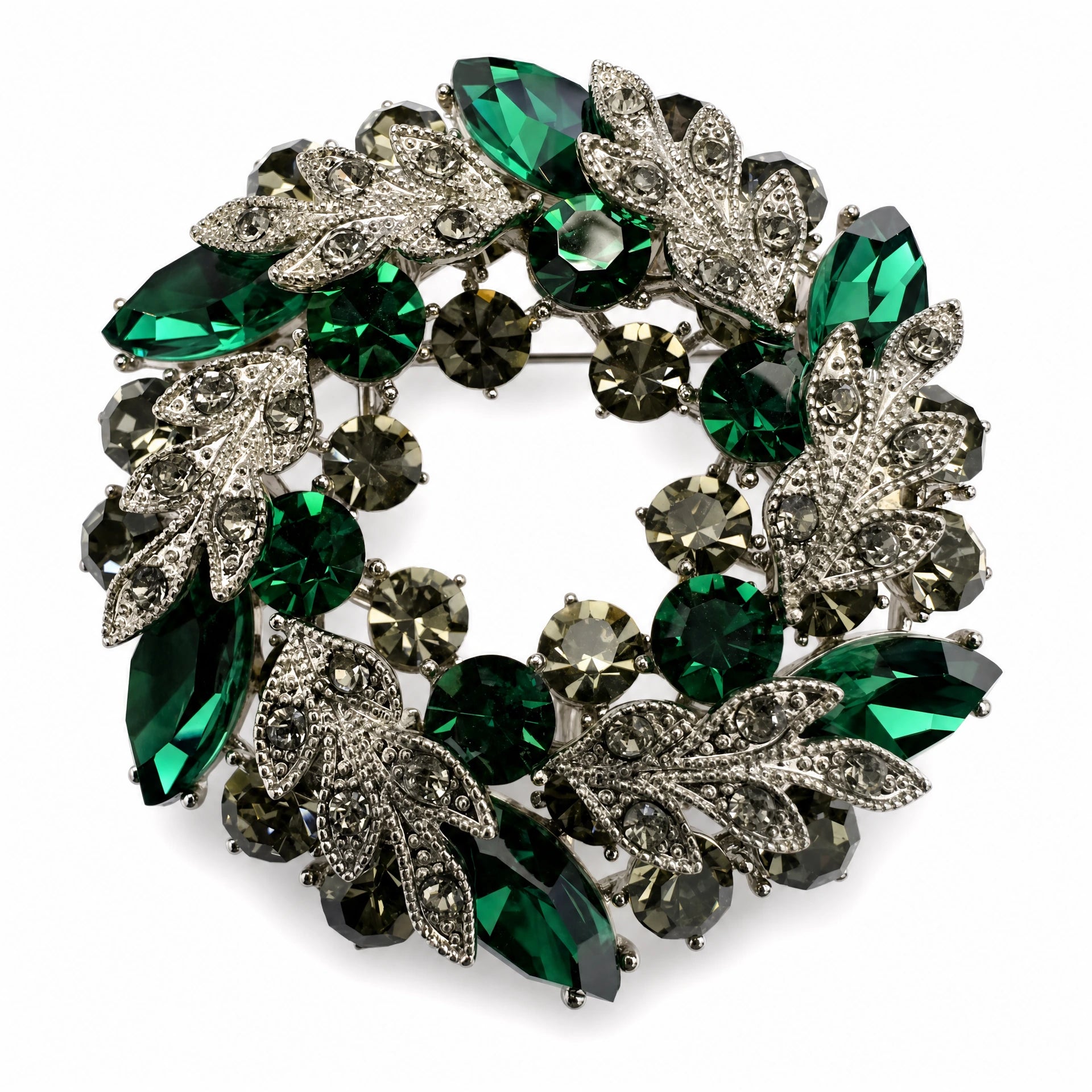 Emerald Green crystal leaf wreath brooch on a white background