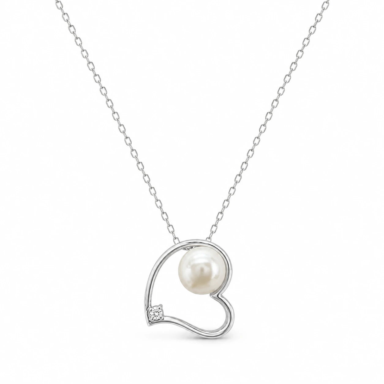 Silver-tone open-heart pendant necklace with a white pearl and clear crystal accent